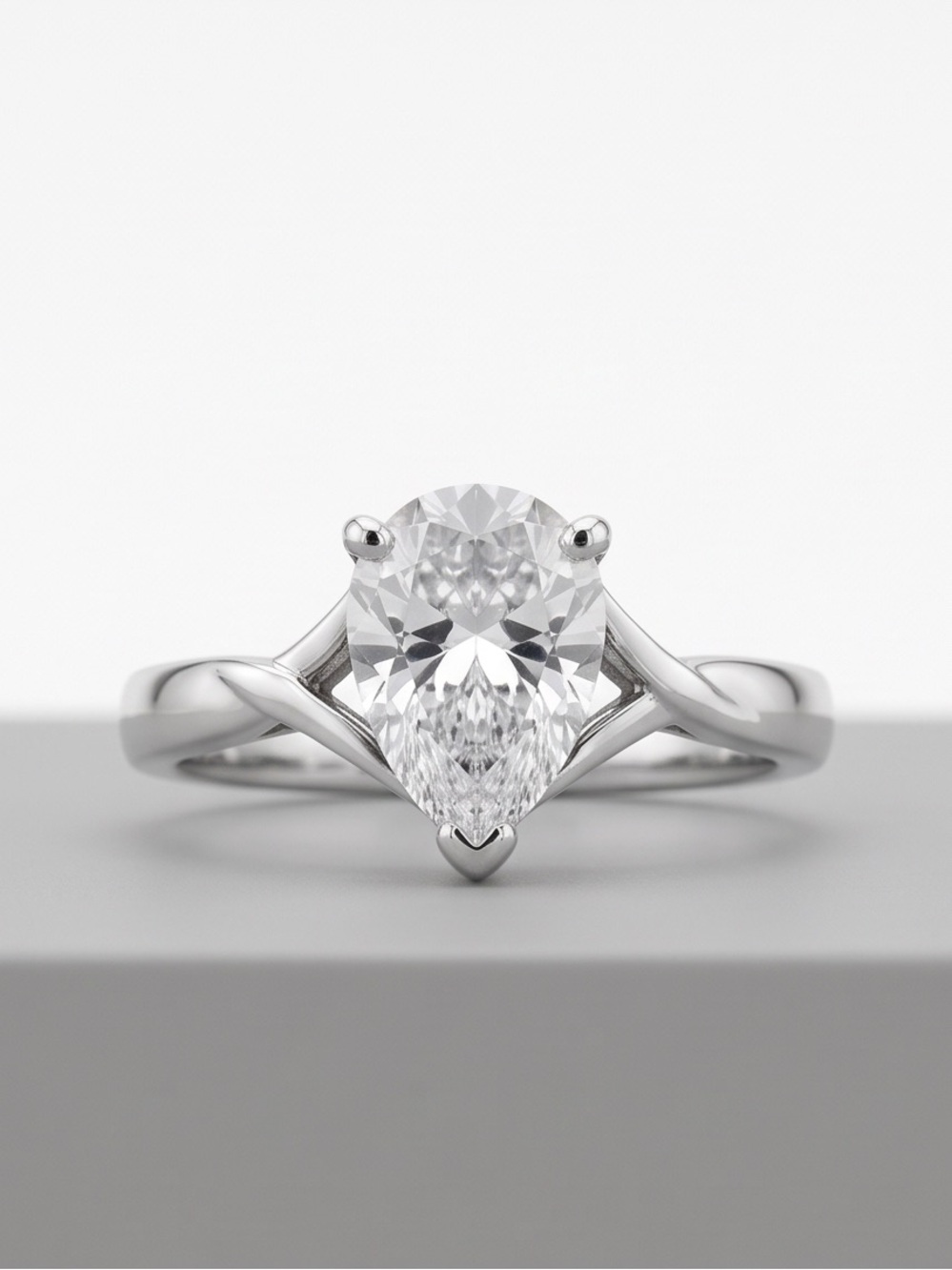 Pear-Cut 2 Carat Elegant Engagement Ring .925
Sterling Silver Size 8